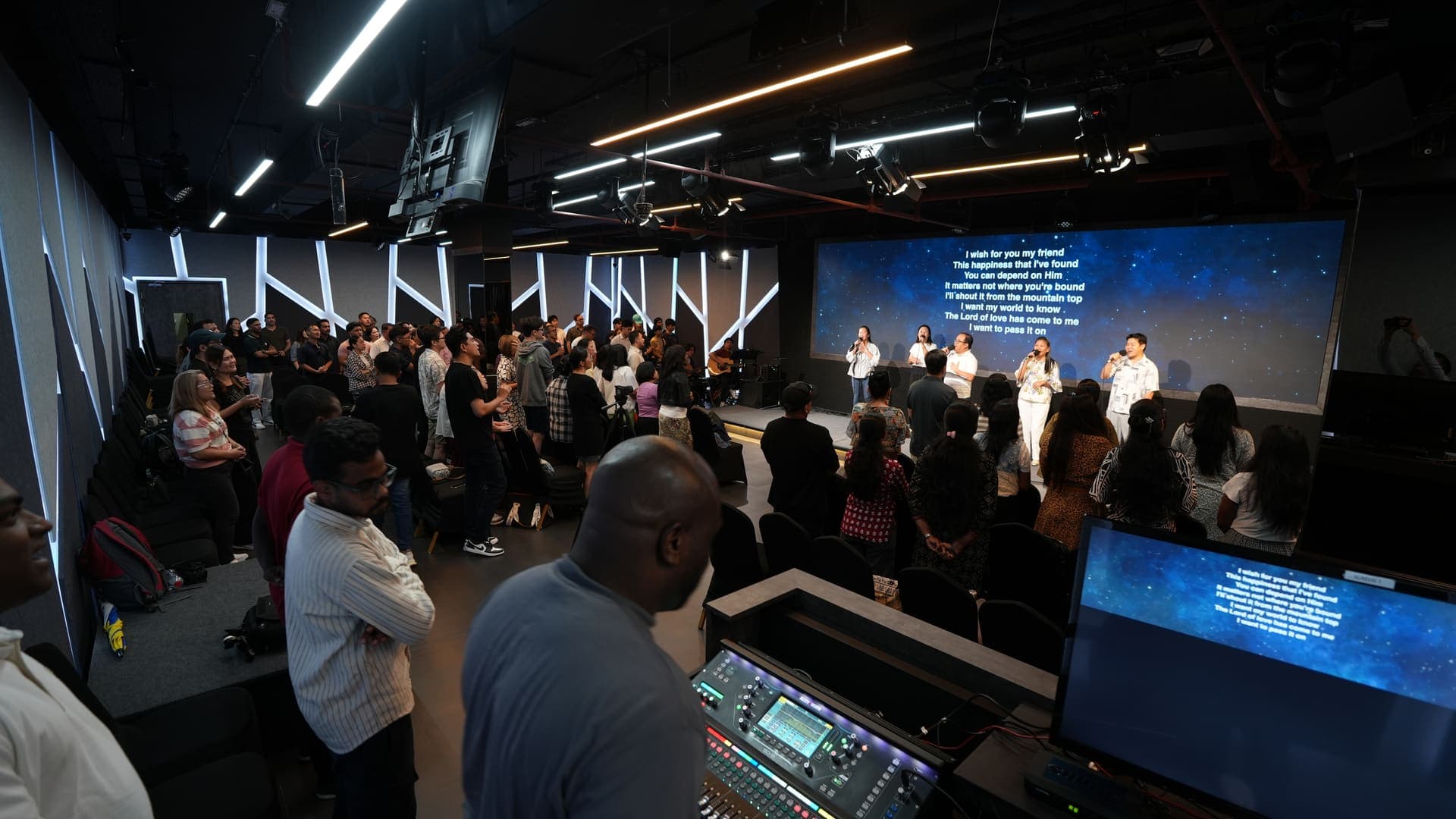Sunday worship at ICOC UAE, seen from the back of Oval Hall, Garhoud